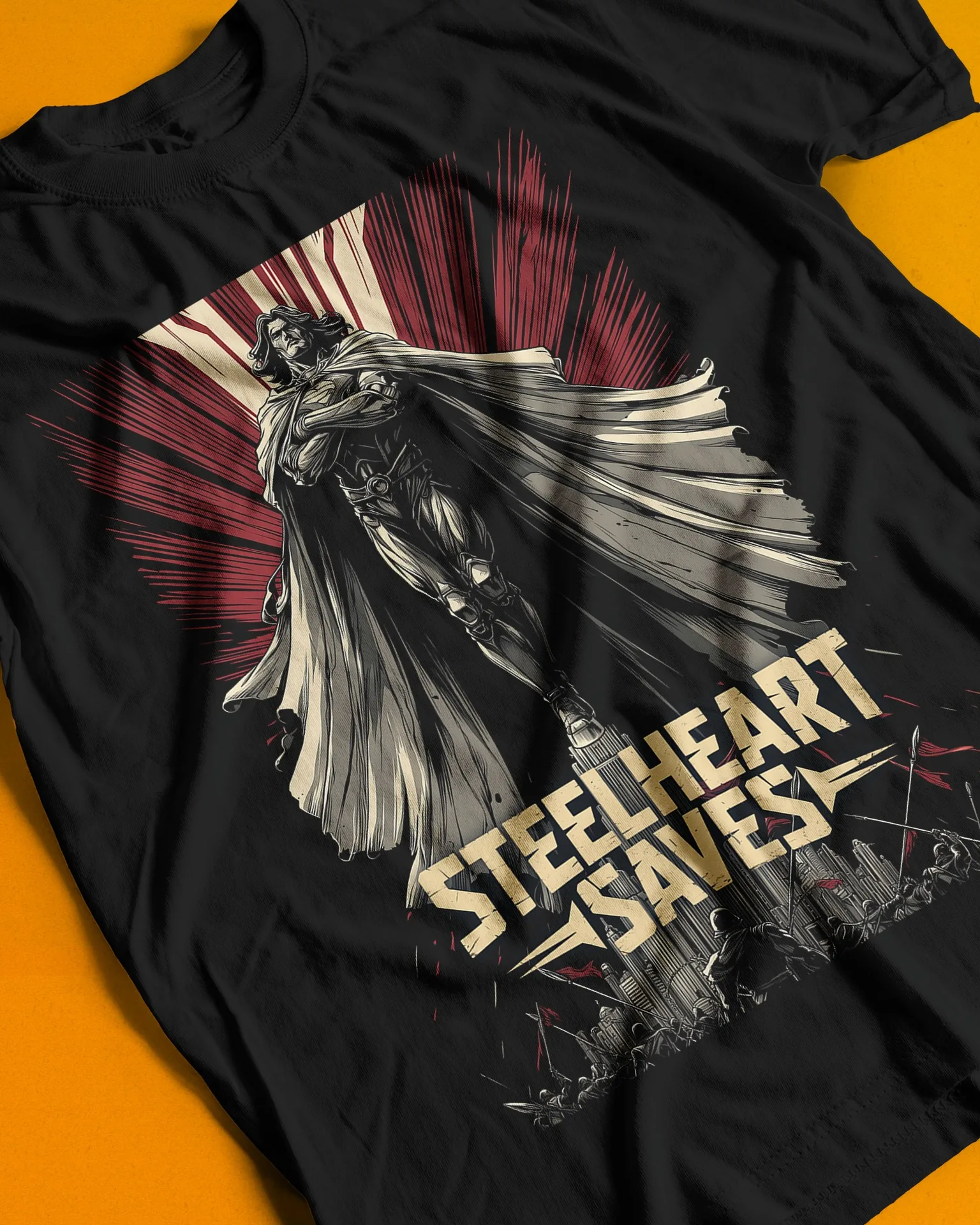Caped hero hovering above a city against red and cream rays, with Steelheart Saves lettering, printed on a black shirt